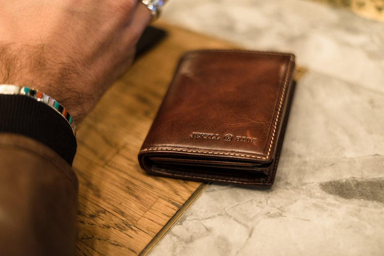 man with his leather wallet