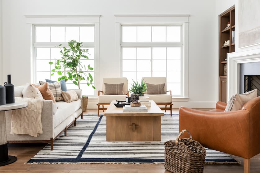 living room with modern sofa bed and armchair