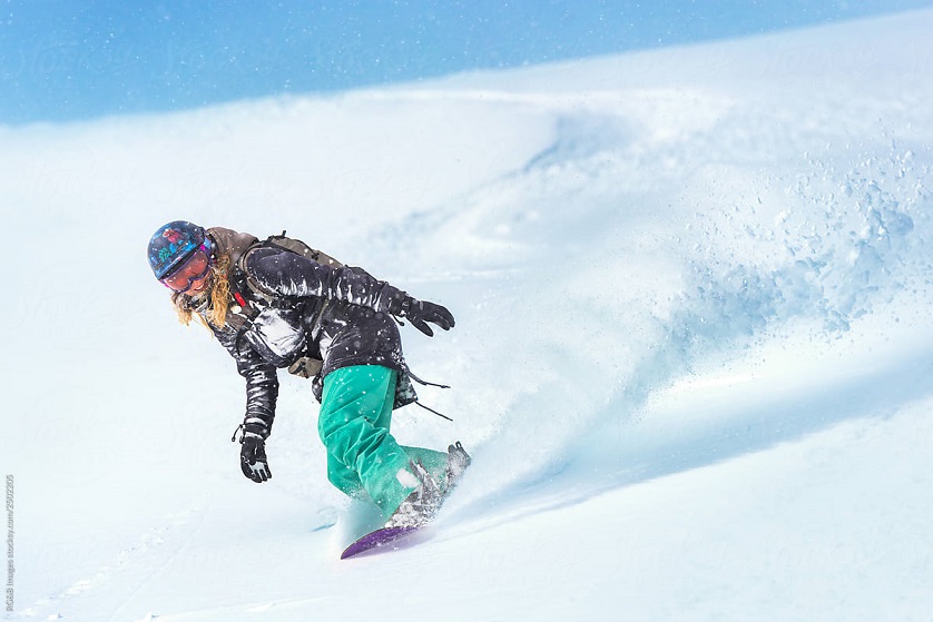 Snowboarding woman