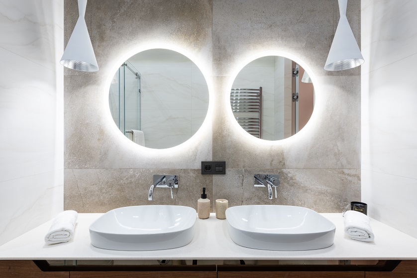 two led mirrors in bathroom