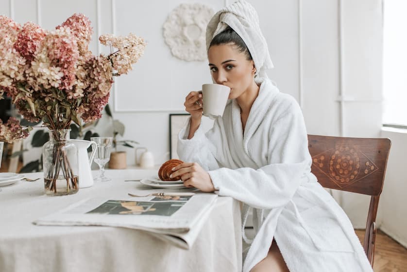 Women drinking tea, wearing robe