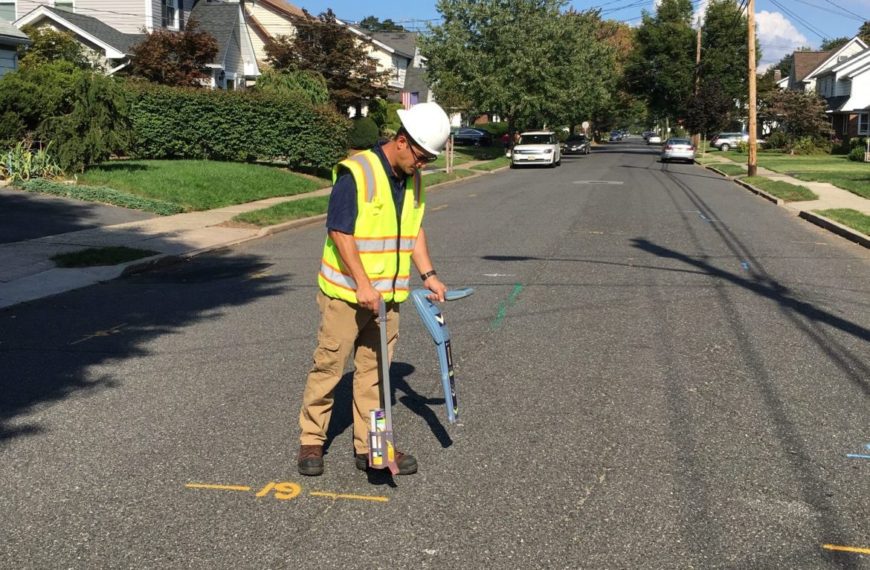 Man working with pipe locator