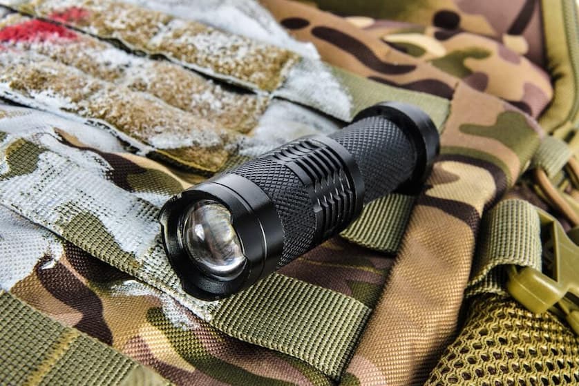 black tactical flashlight
