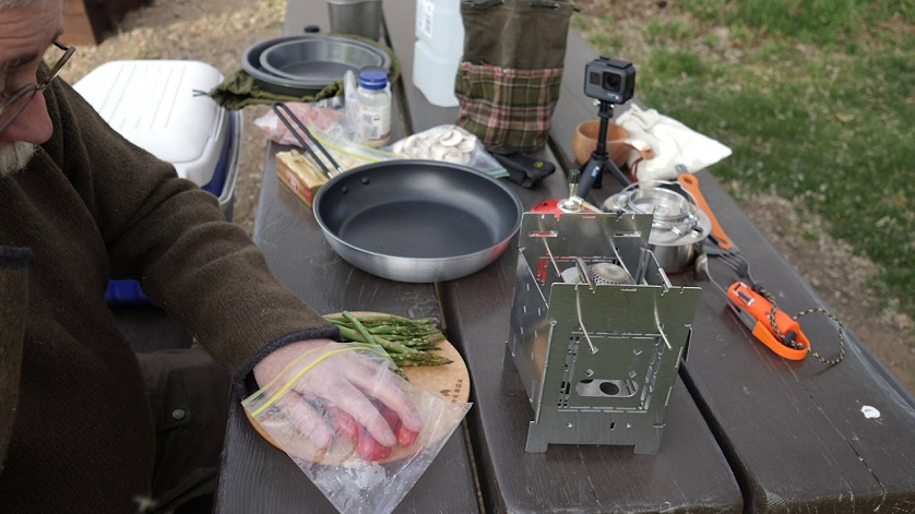 Outdoor cooking gear and firebox stove