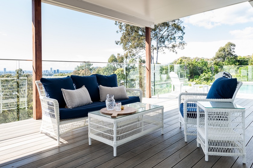 patio with Hamptons-style outdoor furniture in white and blue colors
